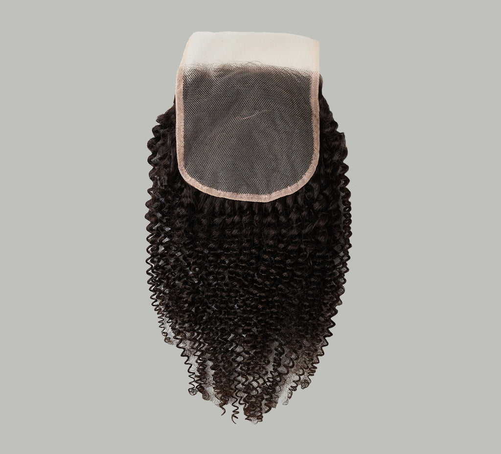 Color swatch of natural black virgin Brazilian curly 5x5 closure hair