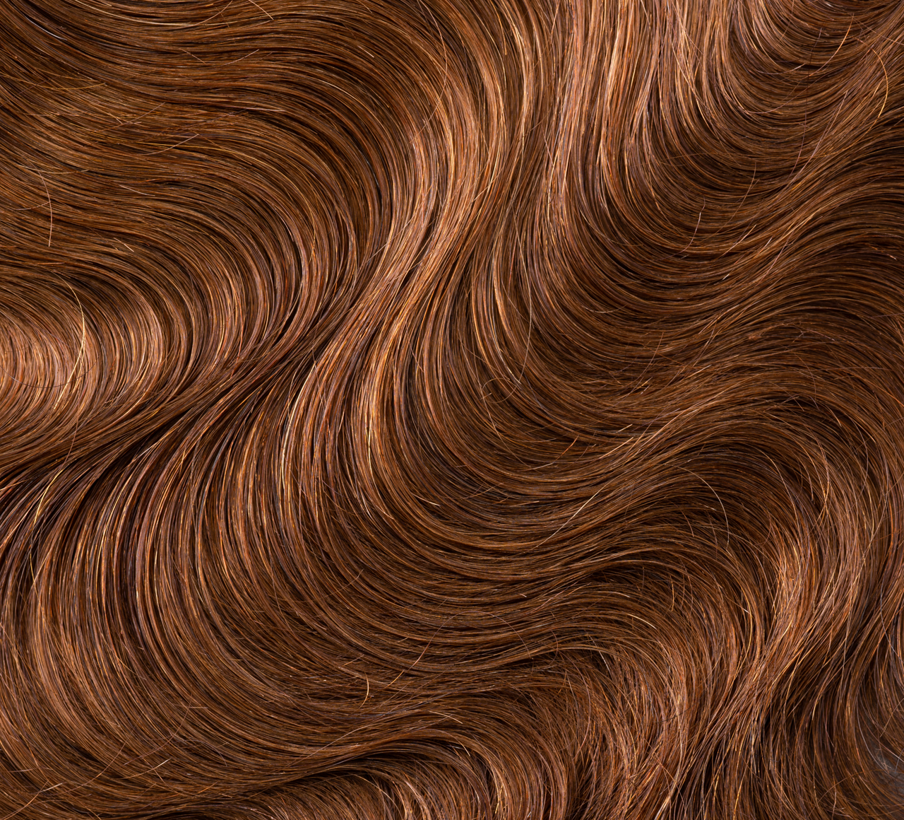 Back view of a caramel brown body wave install with a 5x5 closure