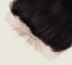 Close-up of transparent lace along a kinky straight frontal hairline