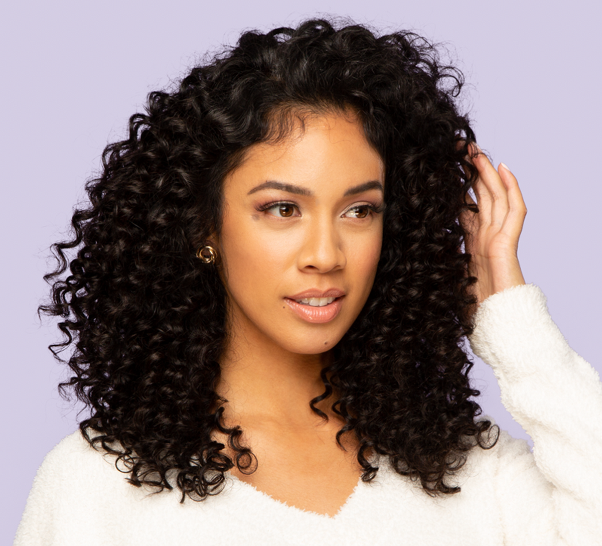 Model wearing a natural black deep wave 13x4 transparent lace frontal