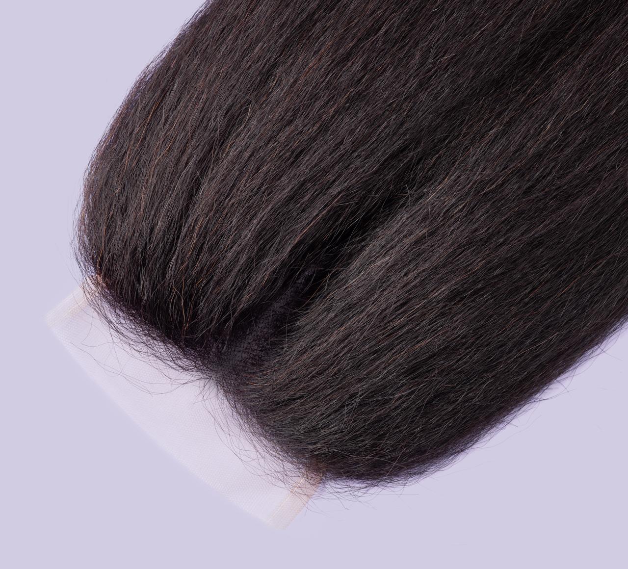 Close-up of the coarse kinky straight texture on a 4x4 lace closure