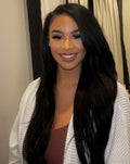 Model wearing a Brazilian yaki straight sew-in, front view