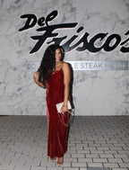 Model wearing a long Malaysian body wave install, full-length view