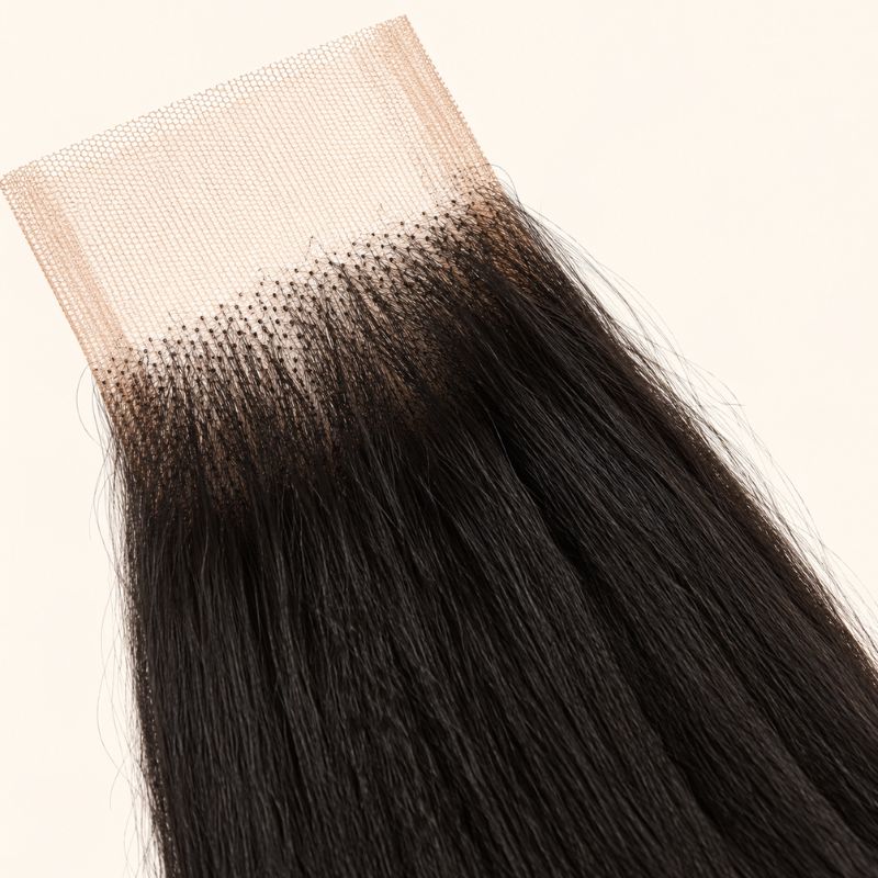 Close-up of the HD lace and parting on a yaki straight 2x6 closure