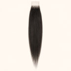 Yaki straight 2x6 HD lace closure in natural black, laid flat showing the full hair length