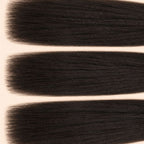 Three yaki straight wefts laid flat, showing the staggered lengths